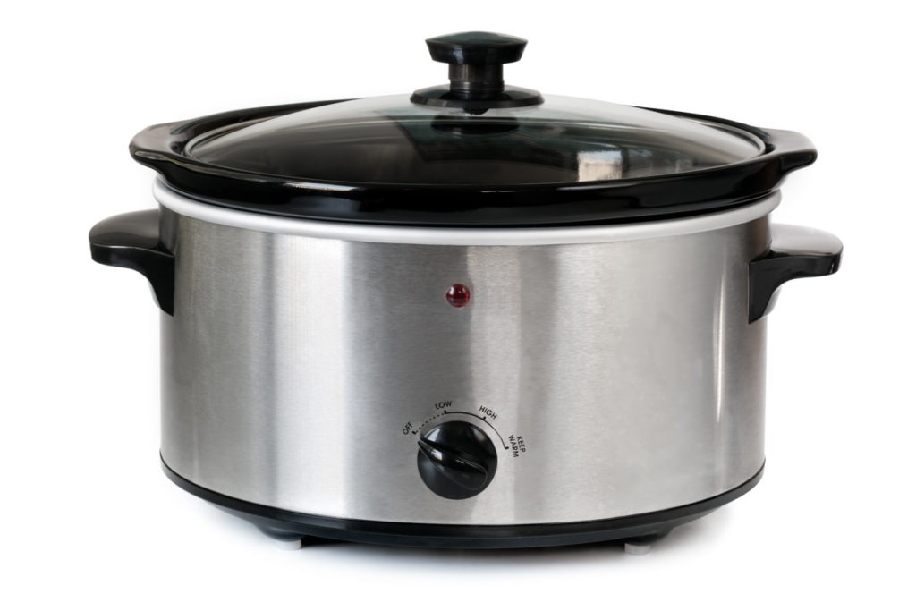 Isolated picture of a silver crock pot