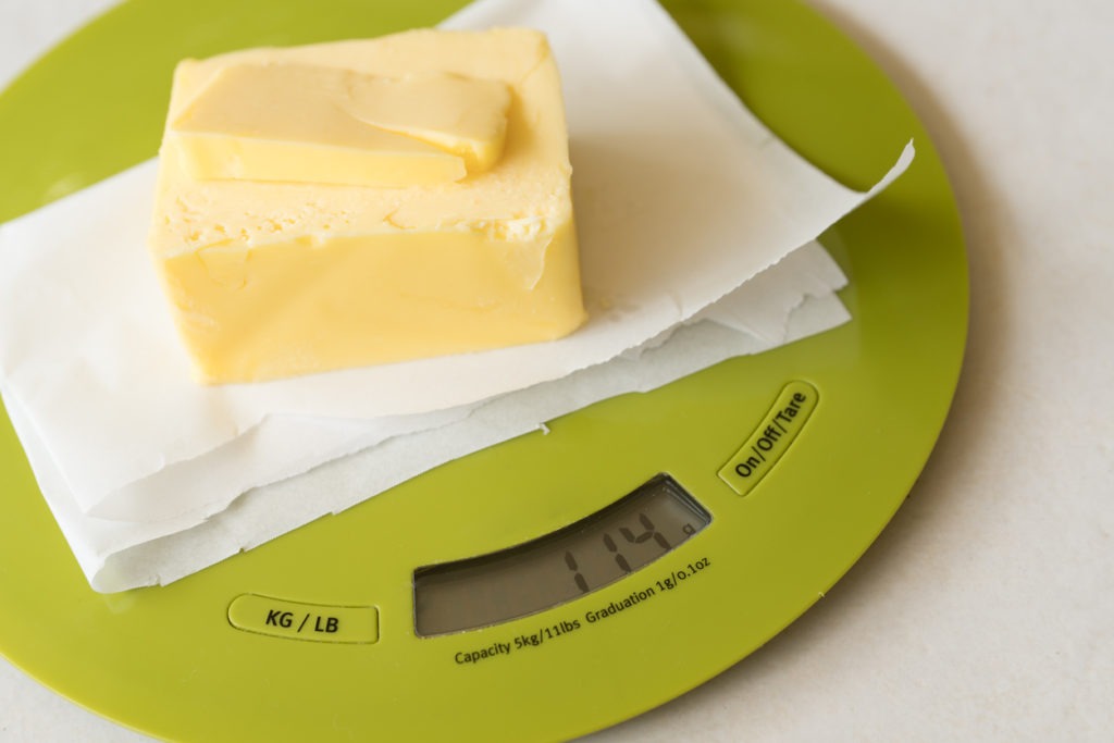 Piece of butter on kitchen scale