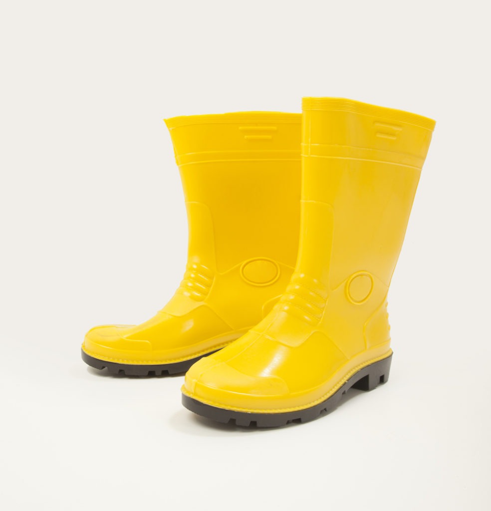 ellow gumboot in white background
