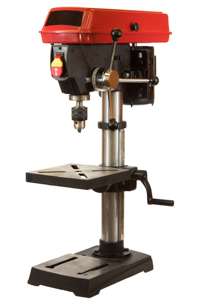 A tabletop drill press