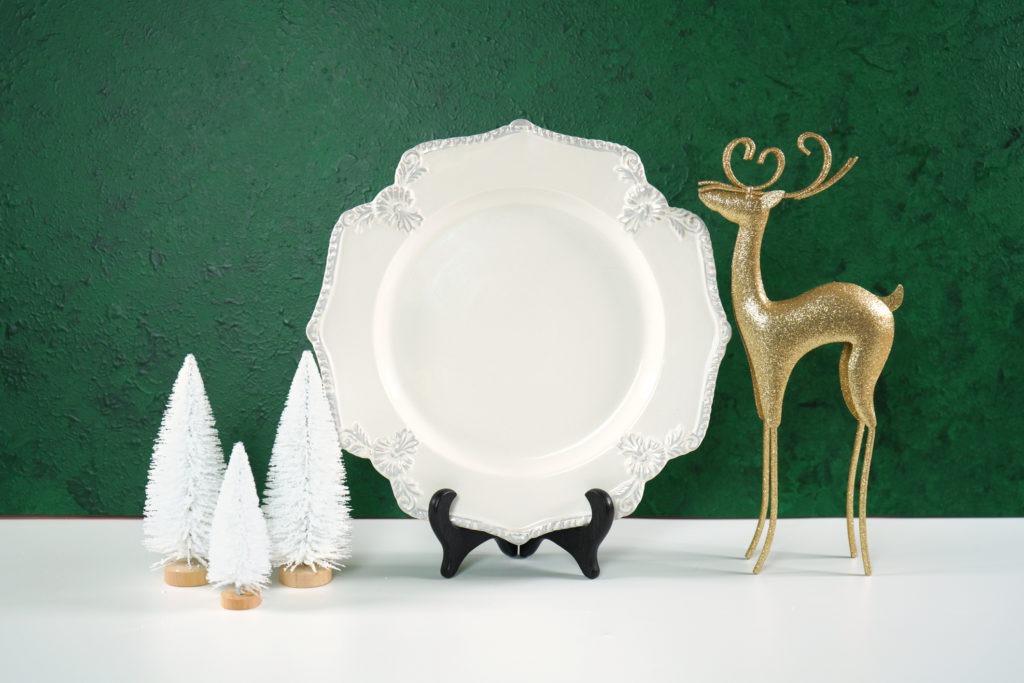 Christmas-green-theme-product-mockup-with-gold-reindeer-and-white-Christmas-trees