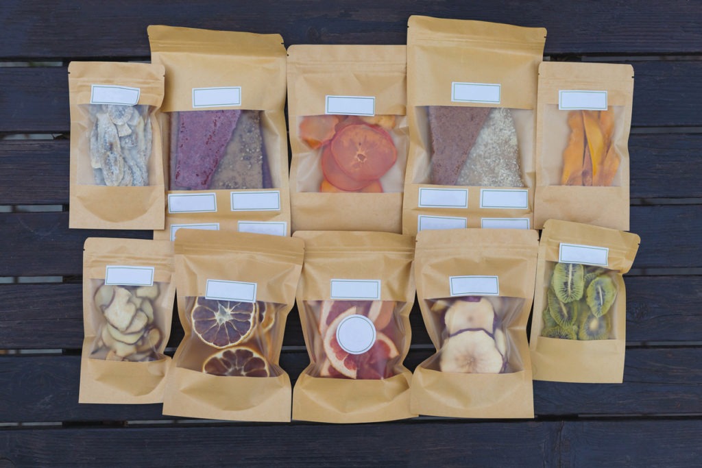 Dried fruits packaged in eco-friendly paper bags