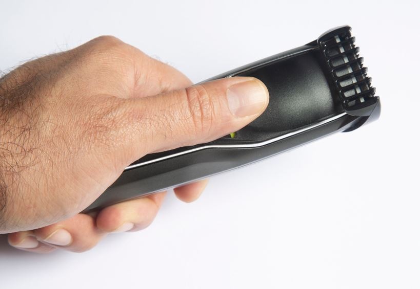 Man holding a shaver.