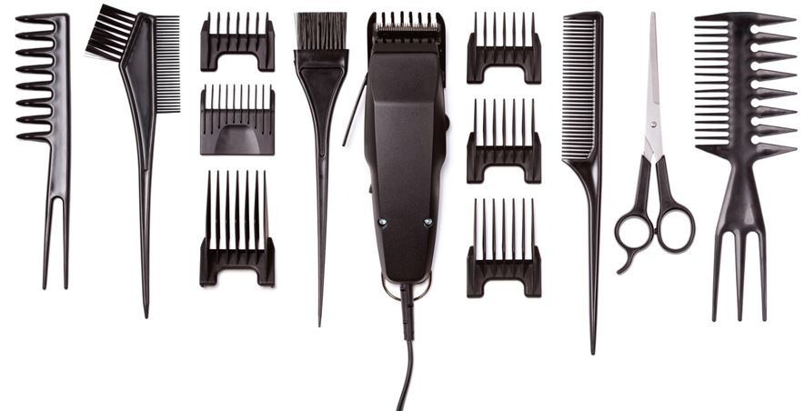 Multiple barber tools and attachments.