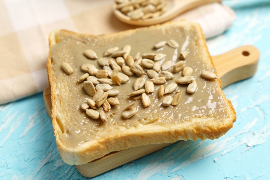 Sunflower seed butter used as a spread on bread