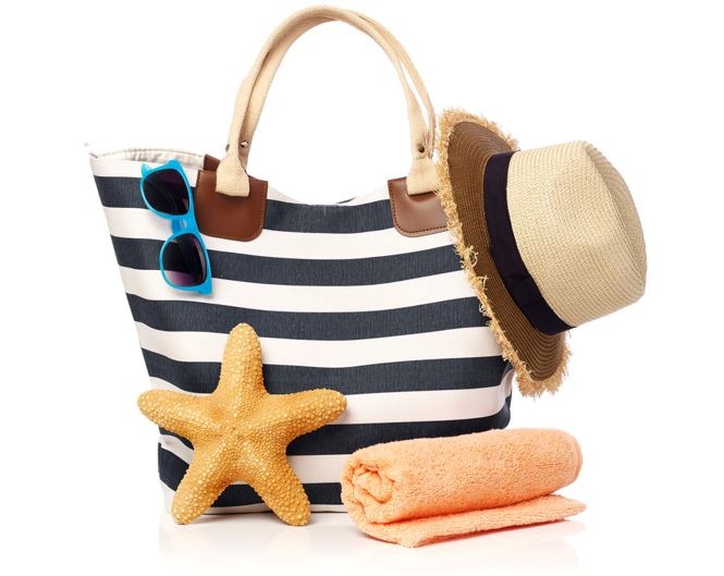 a beach bag along with beach essentials