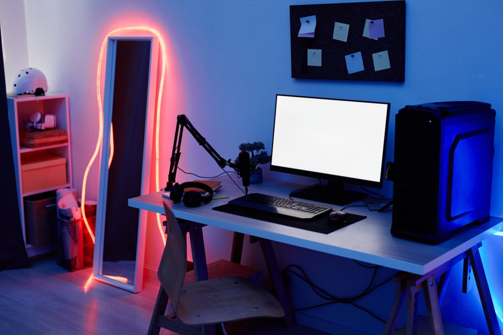 a-gaming-set-up-at-night-with-a-neon-light