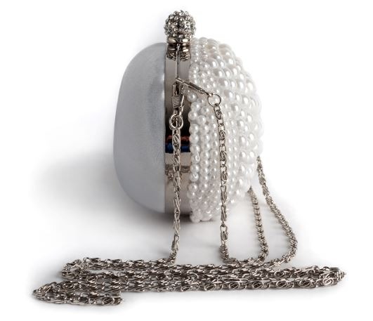a silver minaudiere decorated with pearls