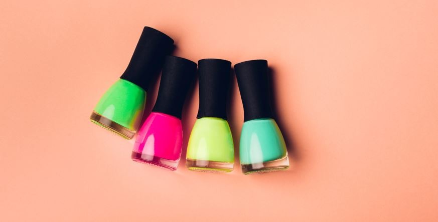 bottles of neon nail polishes