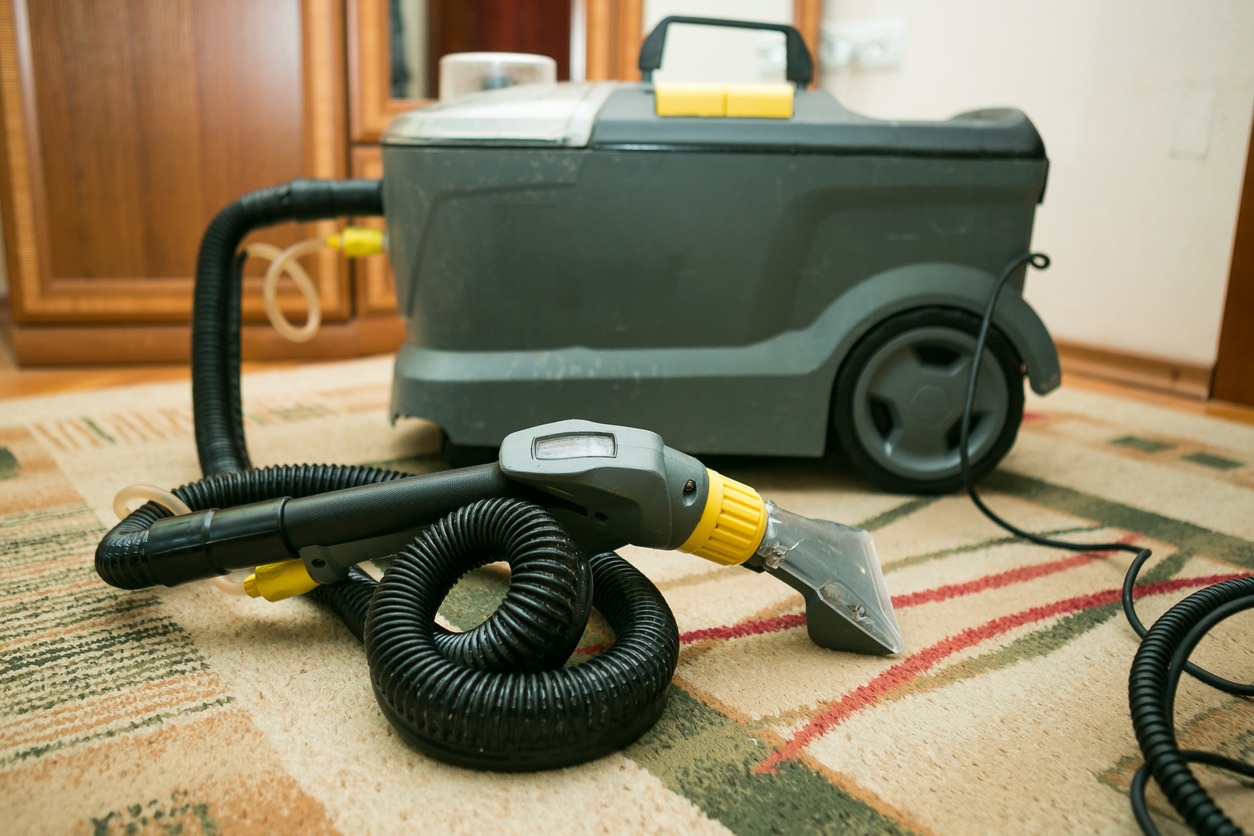 cleaning carpets with a steam vacuum cleaner
