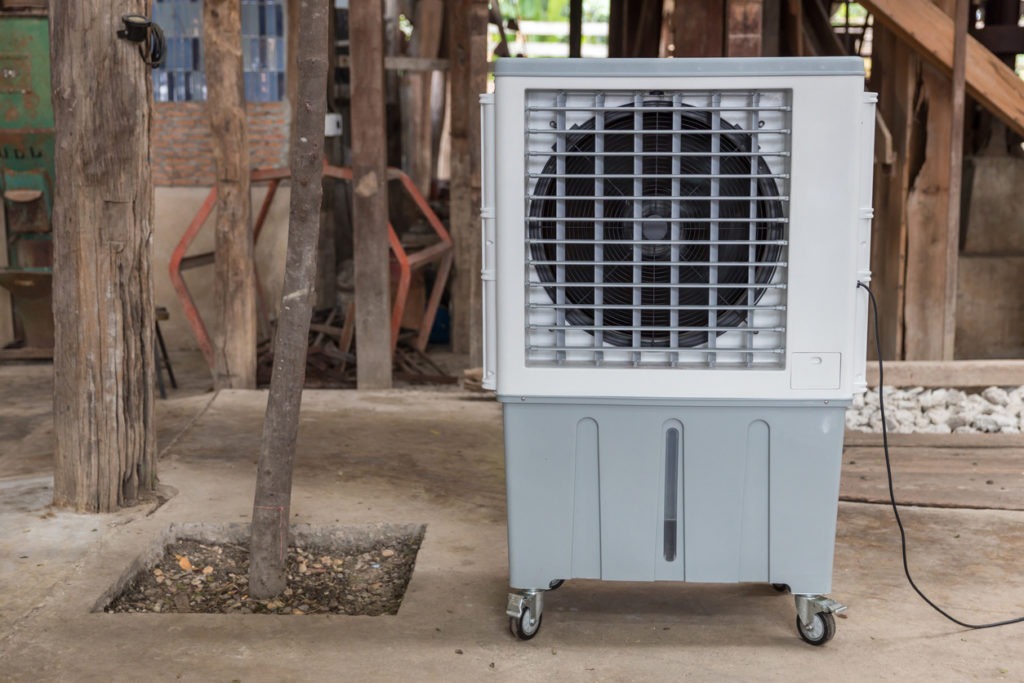 Evaporative Air Cooling Fan. Air conditioning. portable air cooler and humidifier on casters. Mobile air purifier