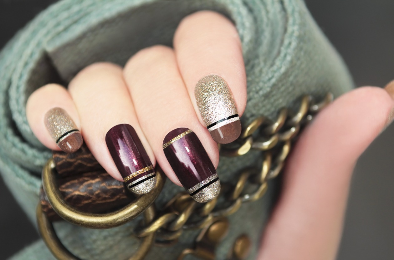 nails painted with metallic nail polish