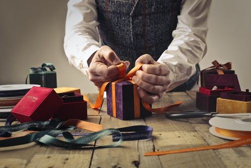A-person-wrapping-the-gift