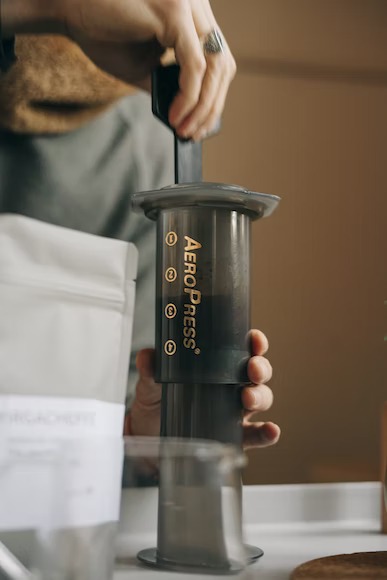 making coffee using AeroPress Coffee Makers
