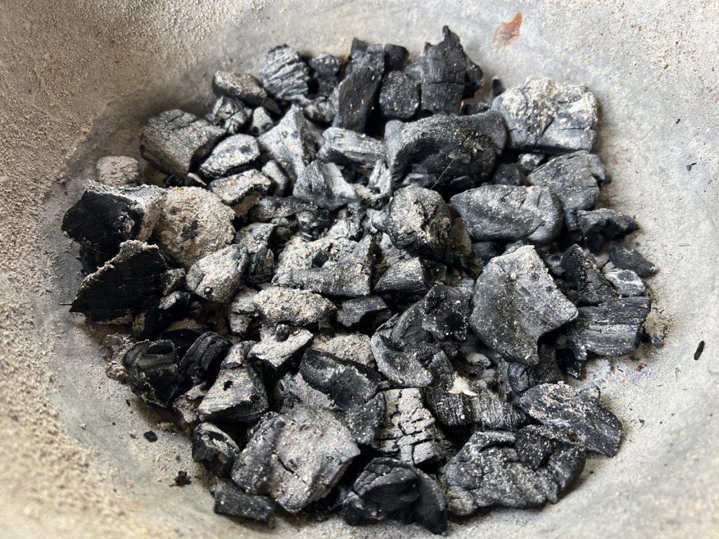Burnt charcoal on a stove