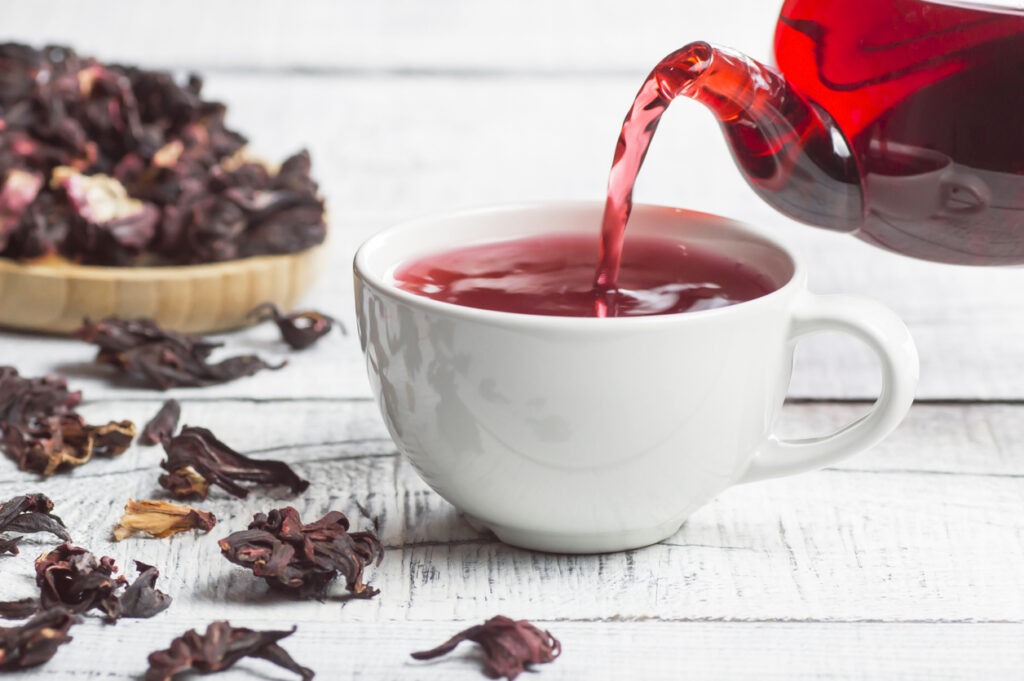 White cup of healthy hibiscus tea