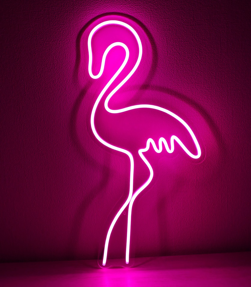 a freestanding neon pink flamingo