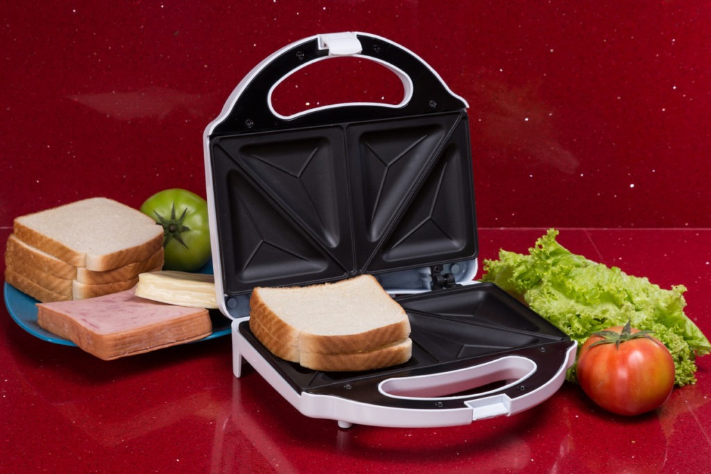 Sandwich maker; photo with ingredients to make sandwiches.