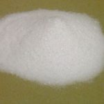 Baking-soda-sodium-bicarbonate-on-a-yellowish-surface