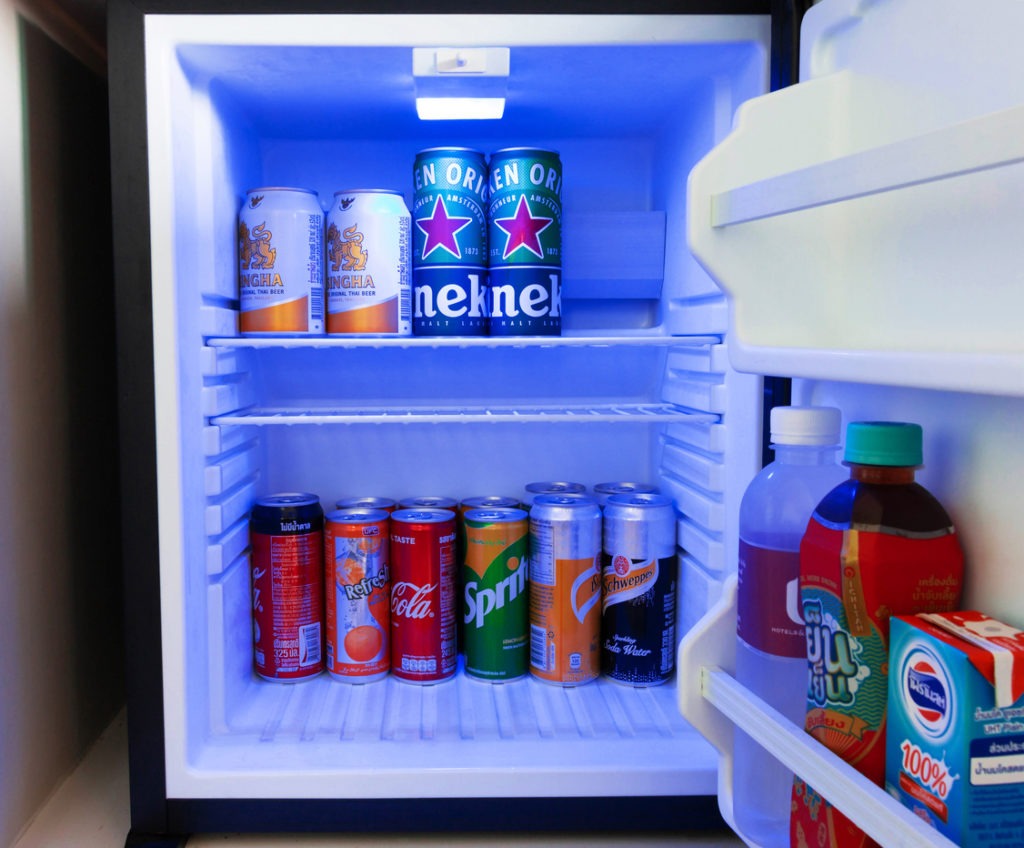 Drinking cans in mini fridge