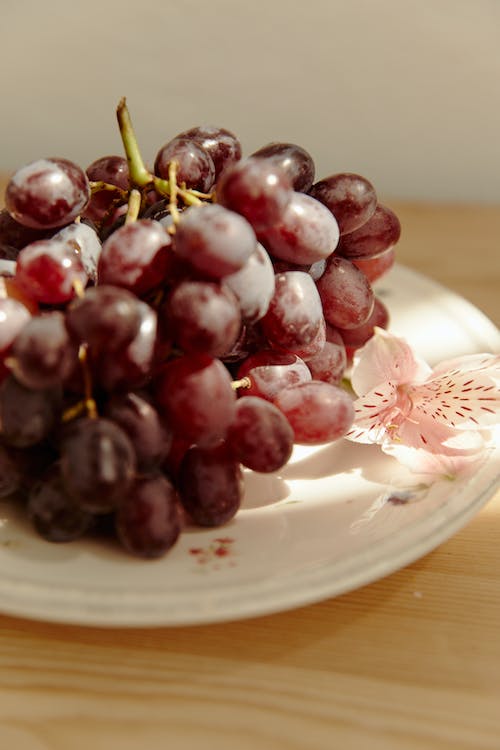 Grapes on a ceramic plate