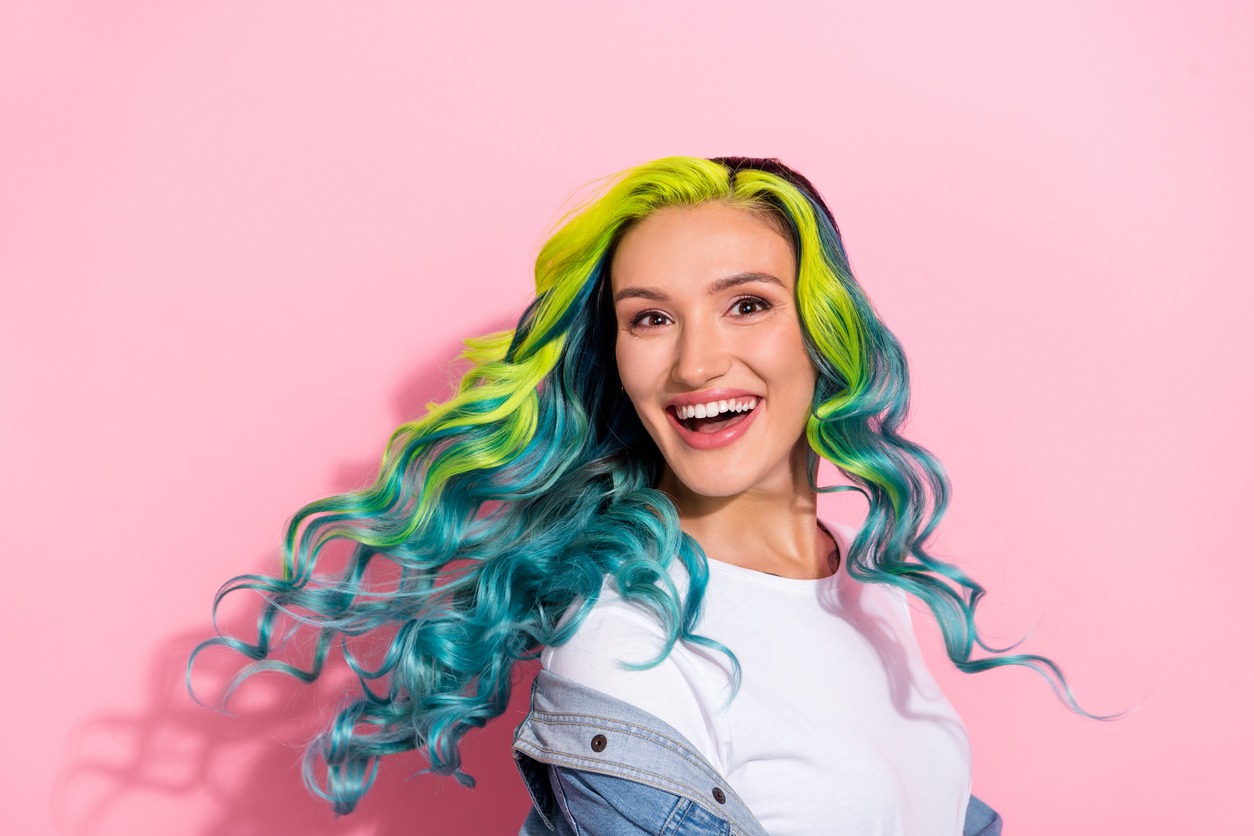 Wavy-haired girl with multiple dye colors