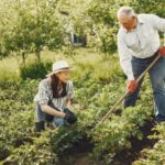 a-father-and-a-daughter-gardening-together