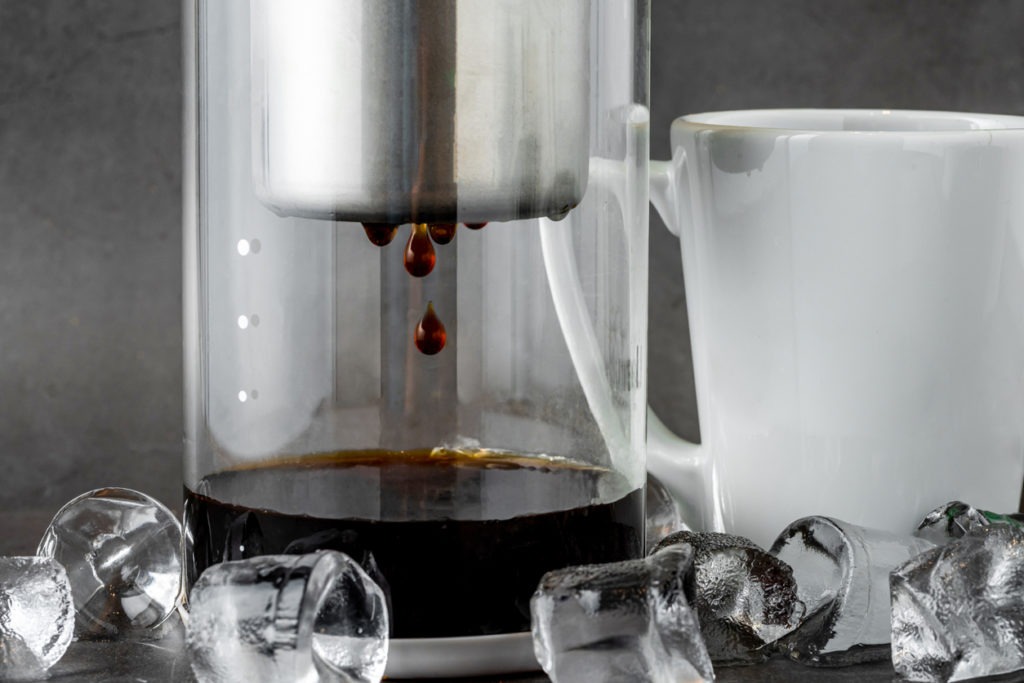 a modern cold brew drip tower coffee maker
