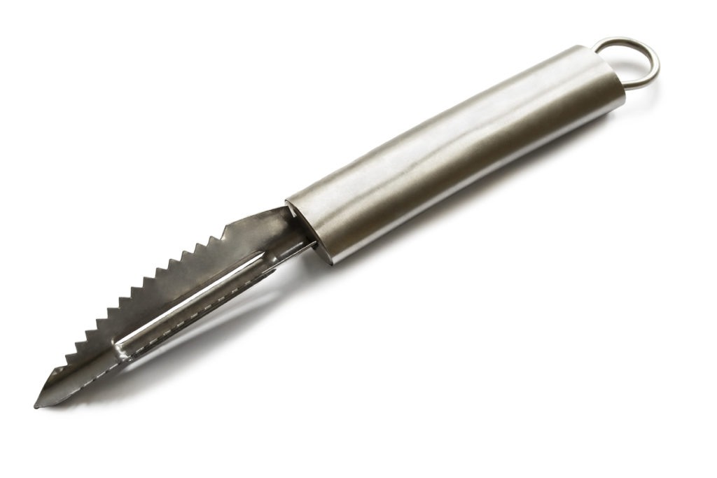 a serrated peeler made of stainless steel