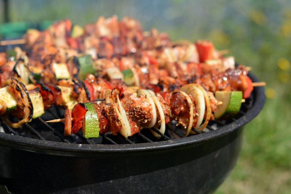 grilling skewers on a grill