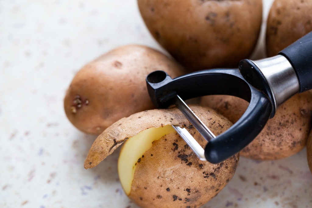 peeling potatoes