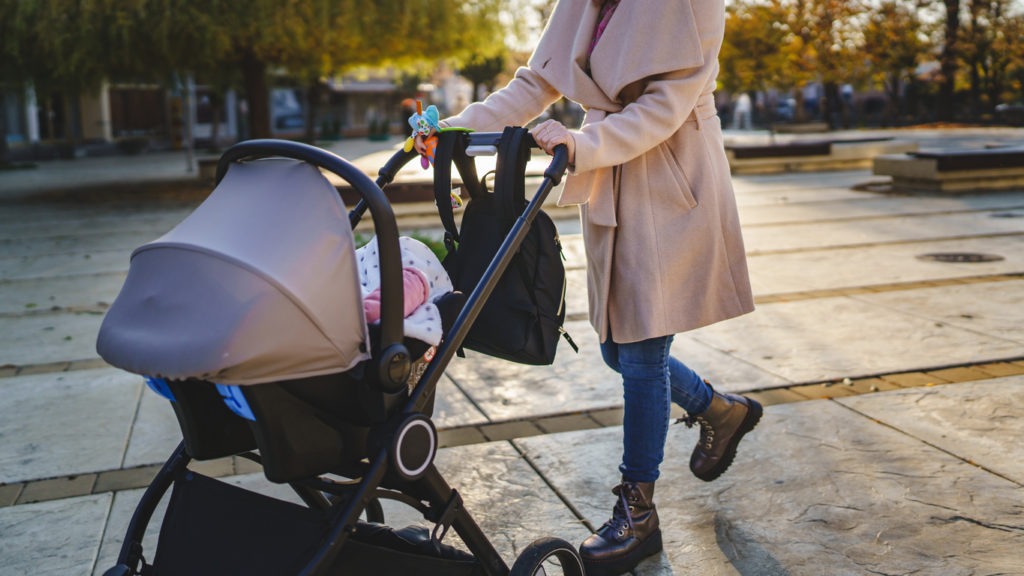 woman with a travel stroller