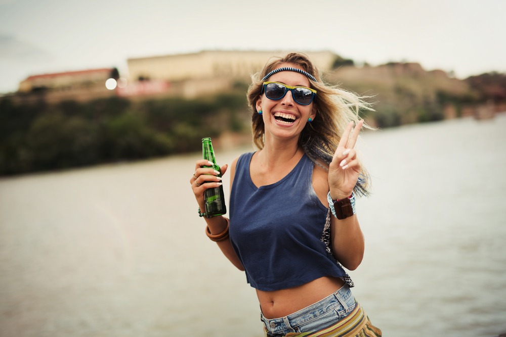 Beautiful blond woman partying and enjoying freedom