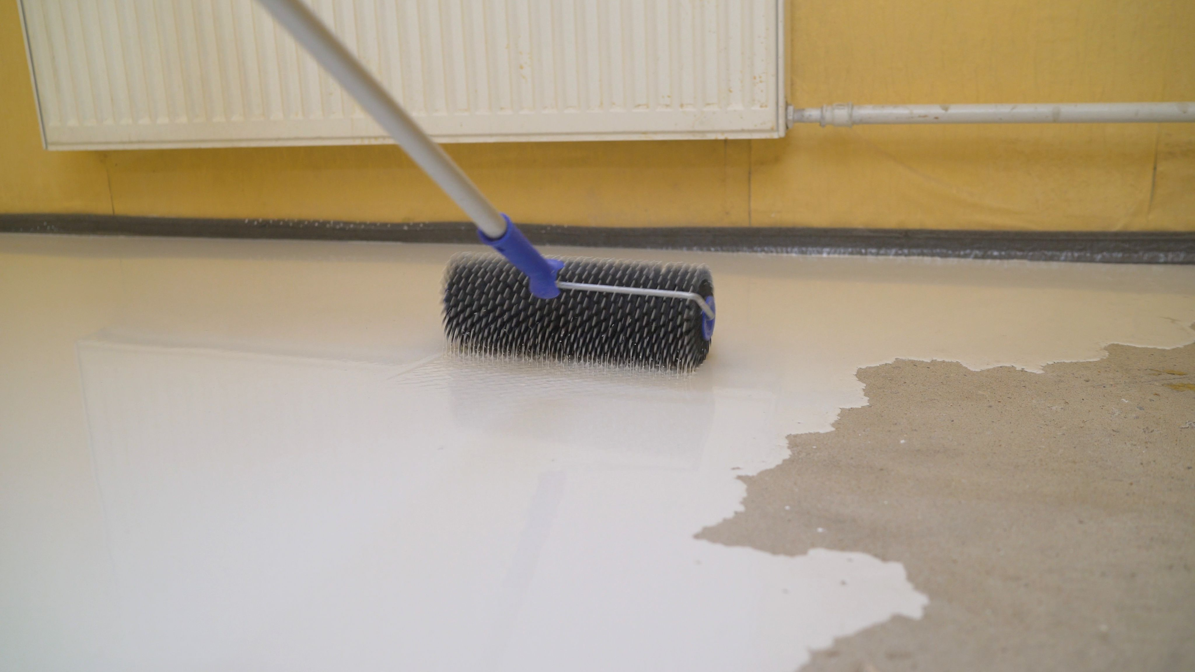 painting a floor with anti-slip paint