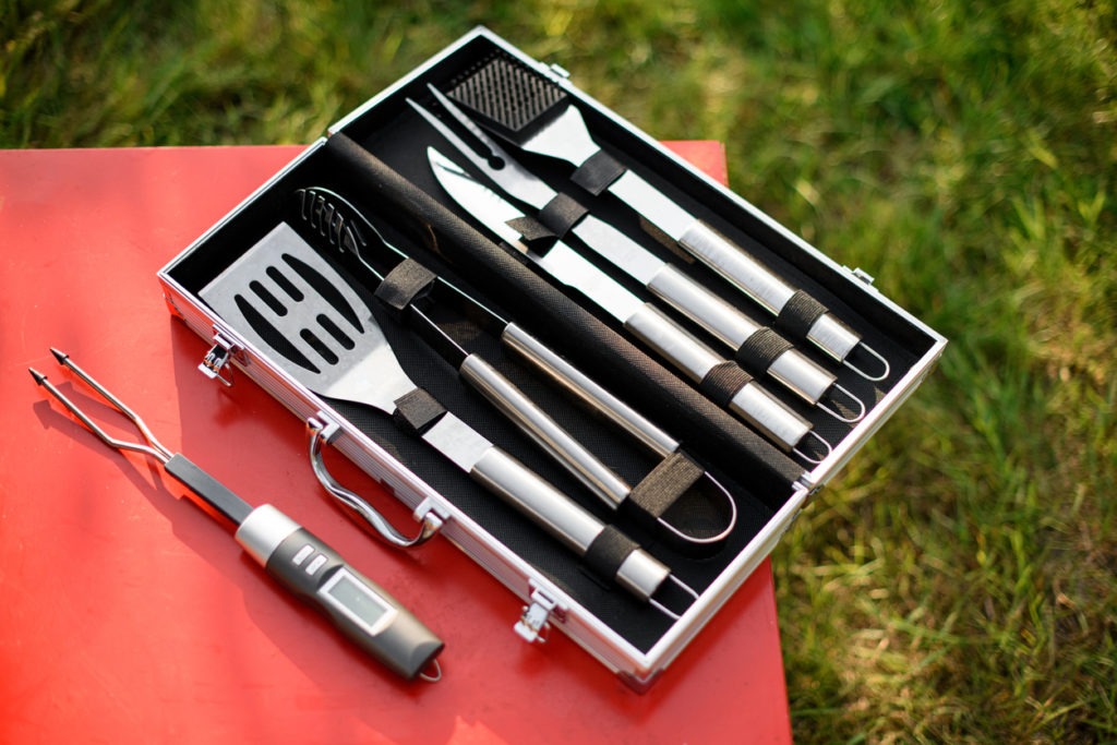 Top view on set of BBQ tools. Barbecue instruments