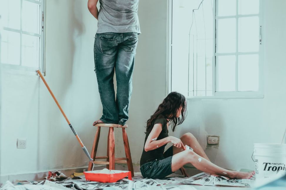 Female, Woman, Human, Decorating, Grey, Home, Pants, Humans, Person, Jeans, Teen, Favorites, Furniture, Standing, Outdoors, Painting