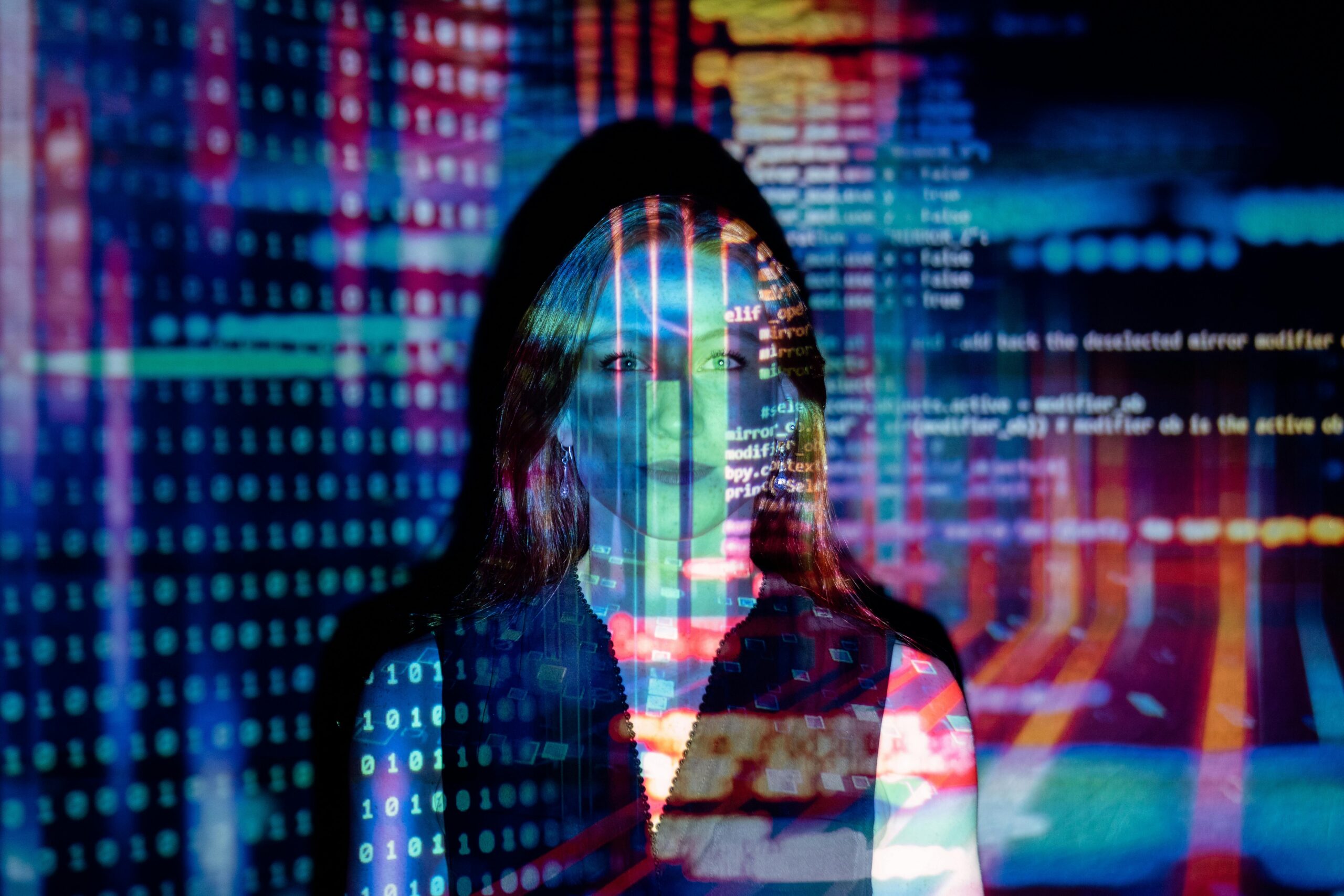 code projected over a woman