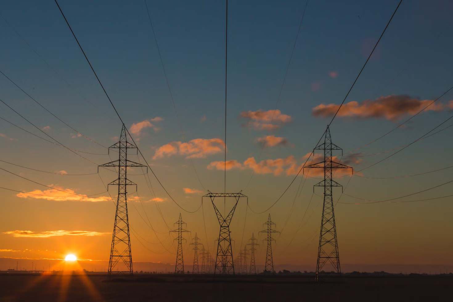 Electrical towers with sunset