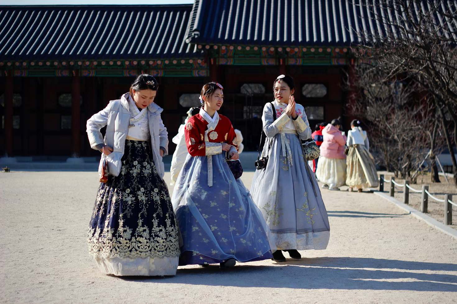 One woman wearing a padded jacket over her hanbok