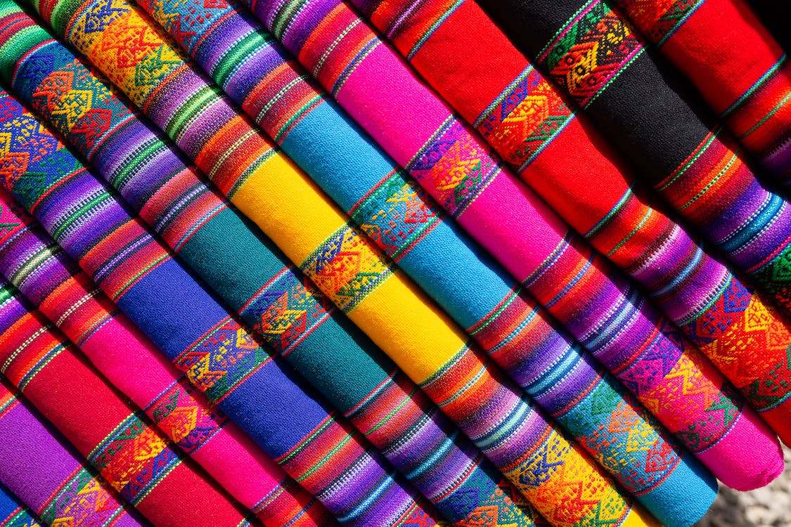 Twelve variations of colorful fabrics