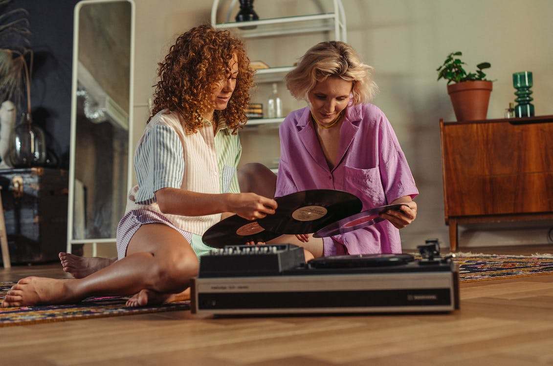 Women with vinyl records