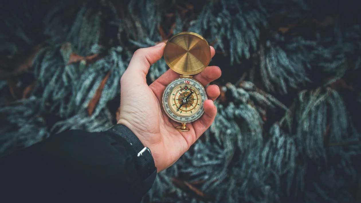 Close-up of a golden compass