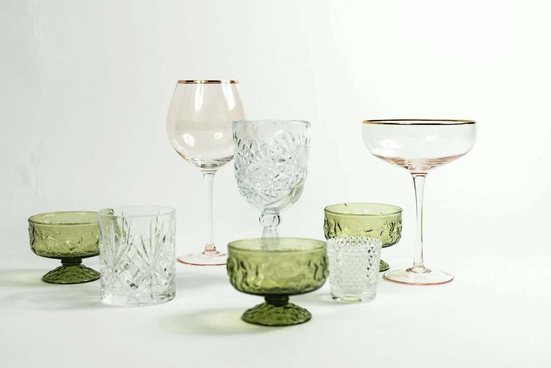 Close-up of different types of crystal cocktail glasses