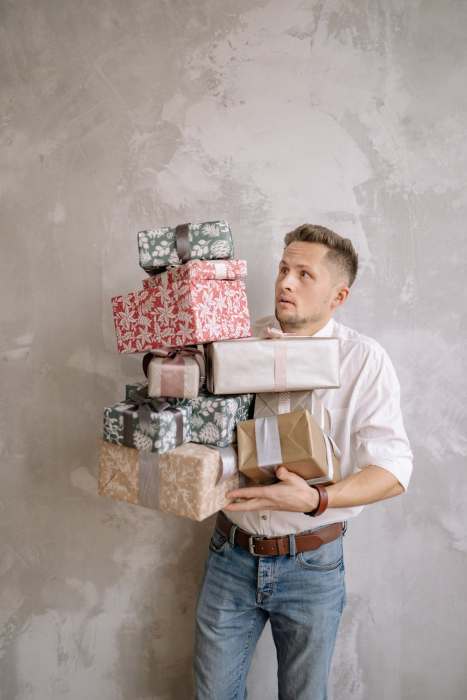 Man carrying gift boxes
