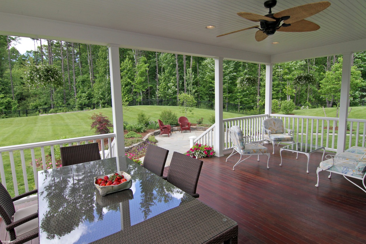 Covered deck, stone patio, landscaped,